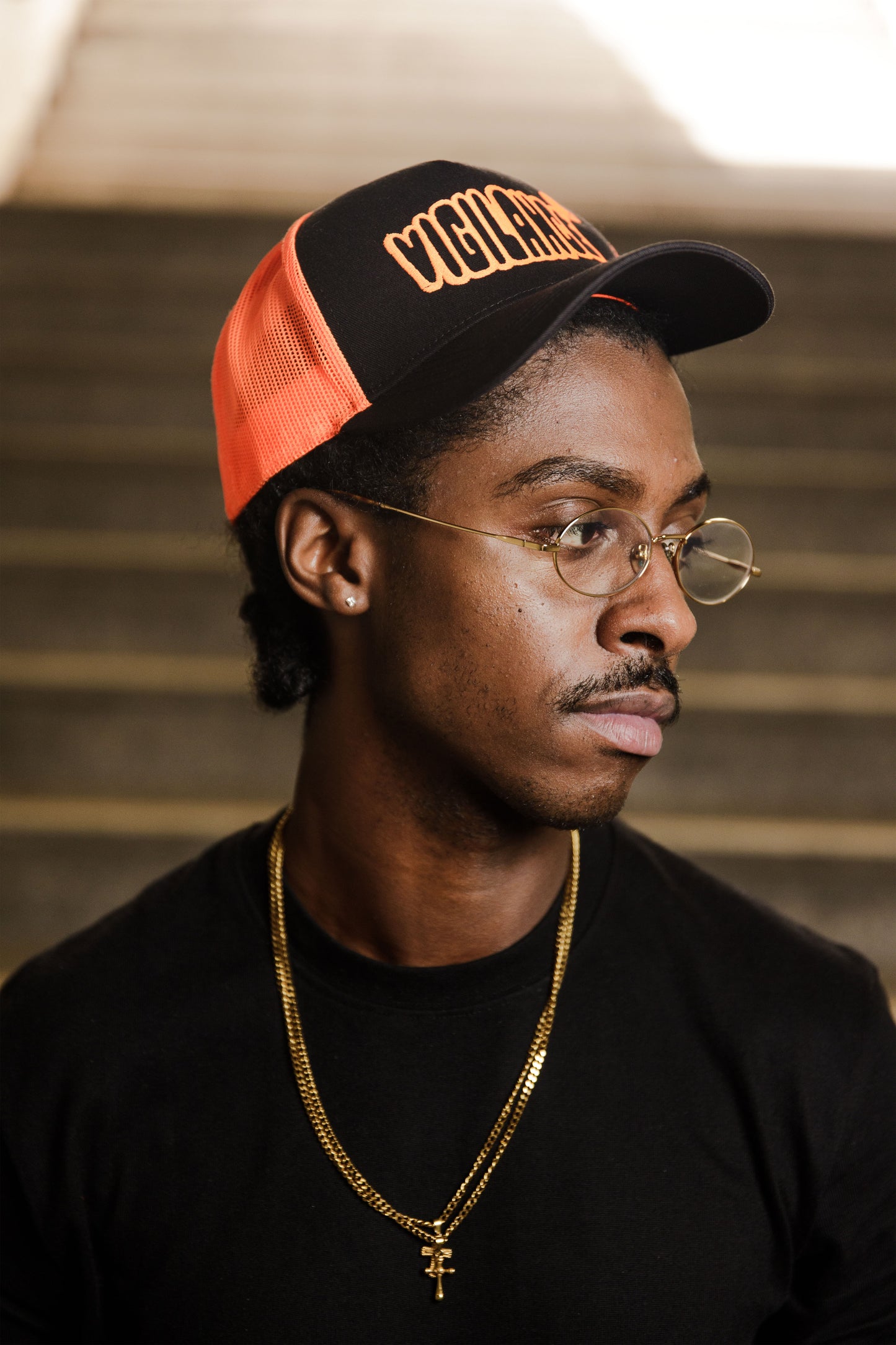 VIGILANCE ORANGE TRUCKER CAP